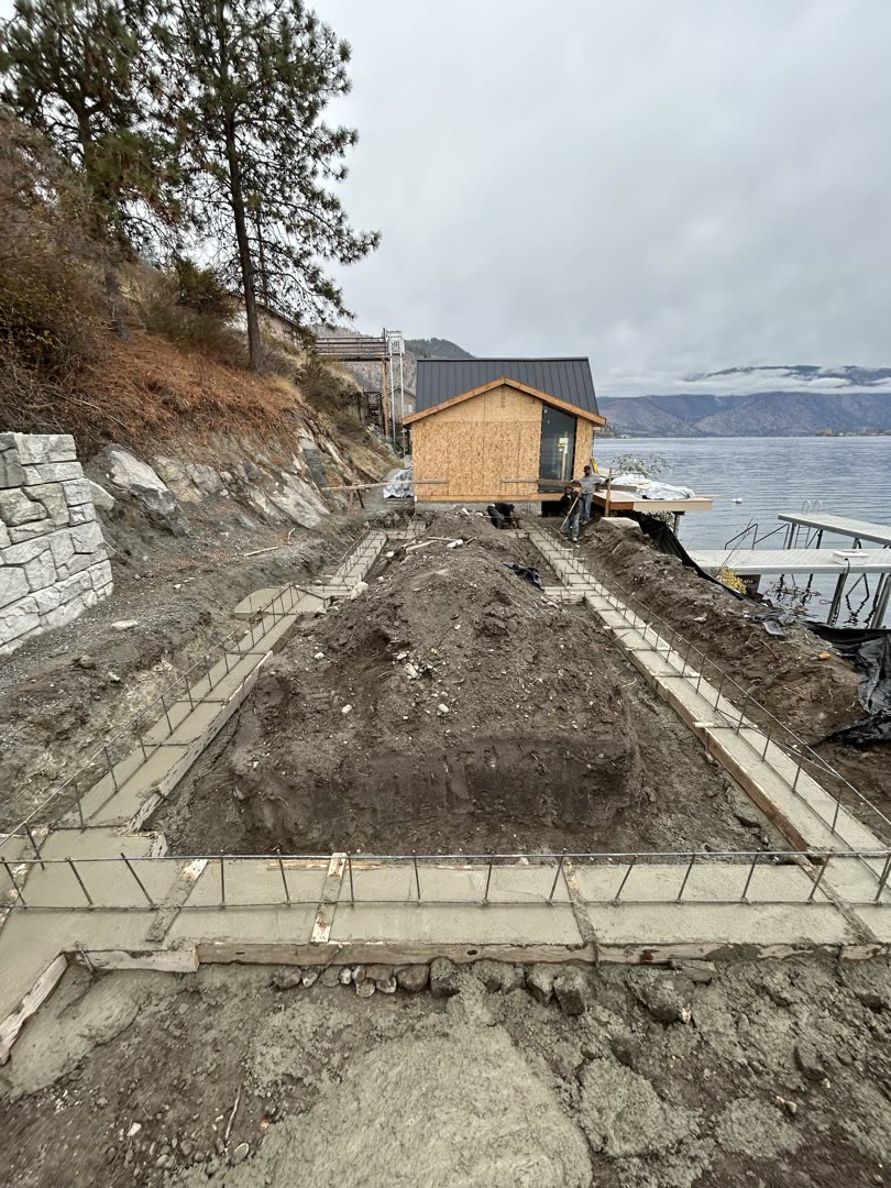 Entiat River Concrete crew preparing footings on a lakeside project near Chelan